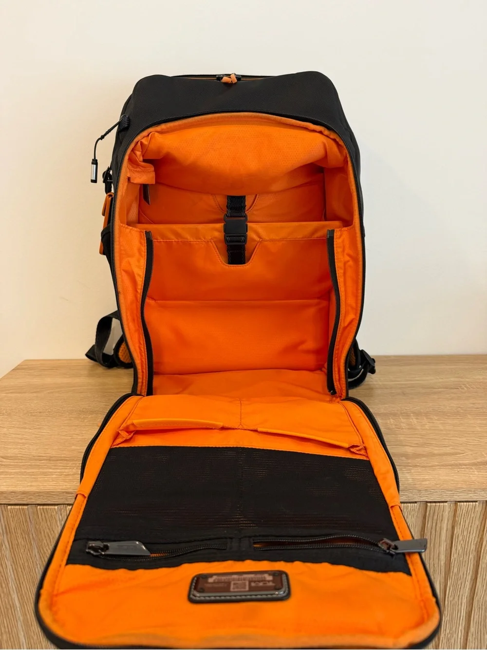 Tumi Black and Orange Men's Backpack with Detachable Travel Pouch